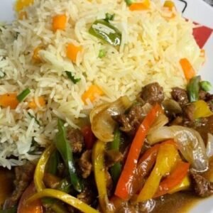 Fried rice with fried beef and mix garden salad